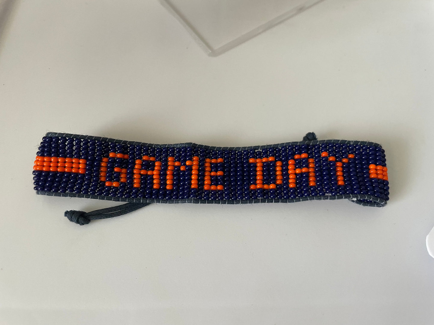 Pull String-Orange and Blue Bracelet